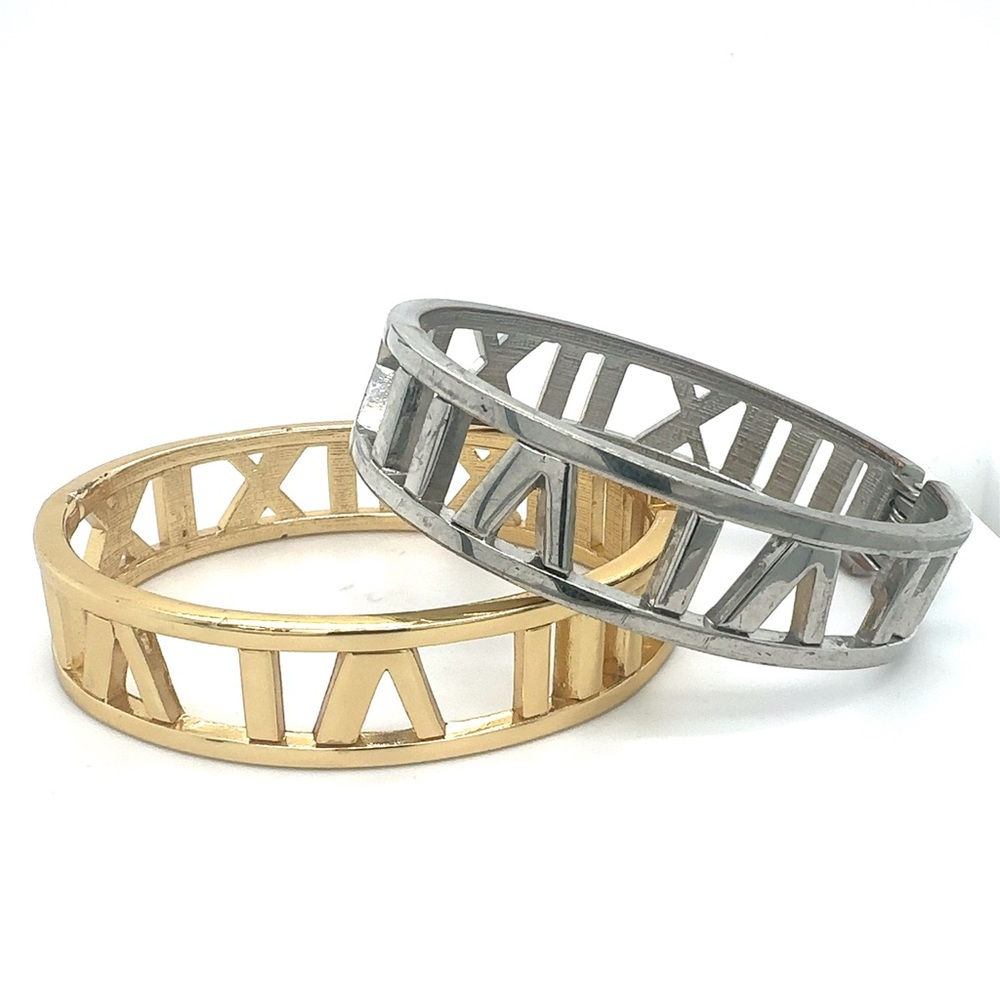 Metal cartier style bracelets with spring hinge.